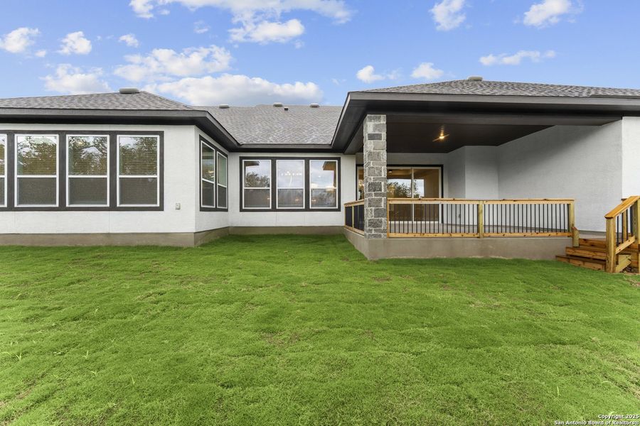 Front exterior of a new home in Megans Landing – Half-Acre Homesites, Castroville, TX, highlighting curb appeal (Image 1). Front exterior of a new home in Megans Landing – Half-Acre Homesites, Castroville, TX, highlighting curb appeal (Image 1).