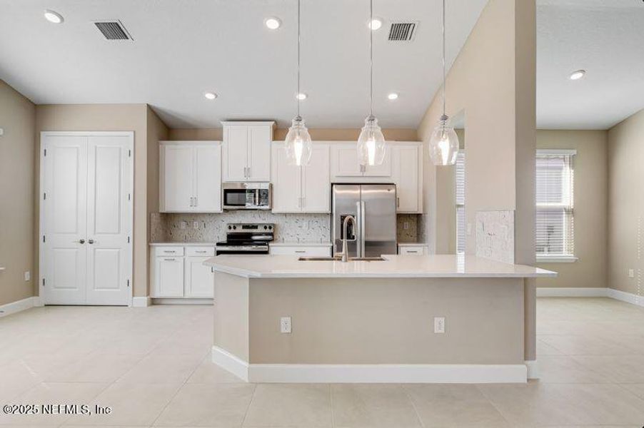 Furnished interior view inside a new home in Colbert Landings, Palm Coast (Image 4).