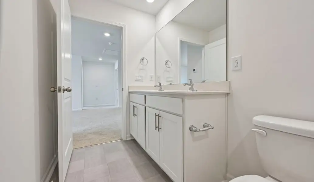 Furnished interior view inside a new home in Shahbain Reserve, Raeford (Image 9). Furnished interior view inside a new home in Shahbain Reserve, Raeford (Image 9).
