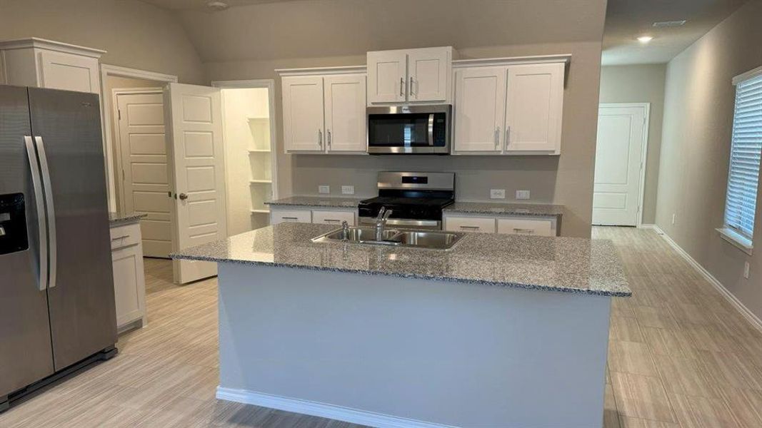 Kitchen- All Home and community information, including pricing, included features, terms, availability and amenities, are subject to change at any time without notice or obligation. All Drawings, pictures, photographs, video, square footages, floor plans, elevations, features, colors and sizes are approximate for illustration purposes only and will vary from the homes as built.