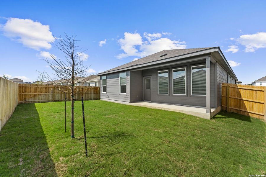 Exterior details and patio area of a home in Hightop Ridge, Converse (Image 2).