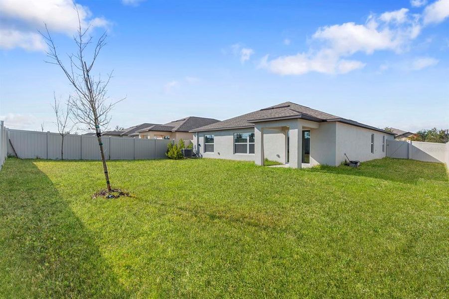Exterior details and patio area of a home in North Park Isle: The Estates II, Plant City (Image 31). Exterior details and patio area of a home in North Park Isle: The Estates II, Plant City (Image 31).