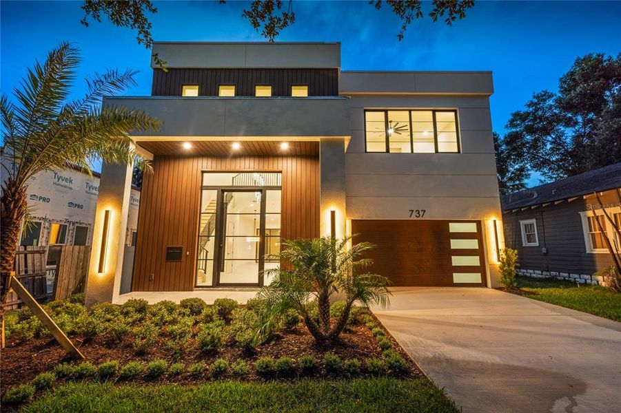Front exterior of a new home in , Orlando, FL, highlighting curb appeal (Image 26).