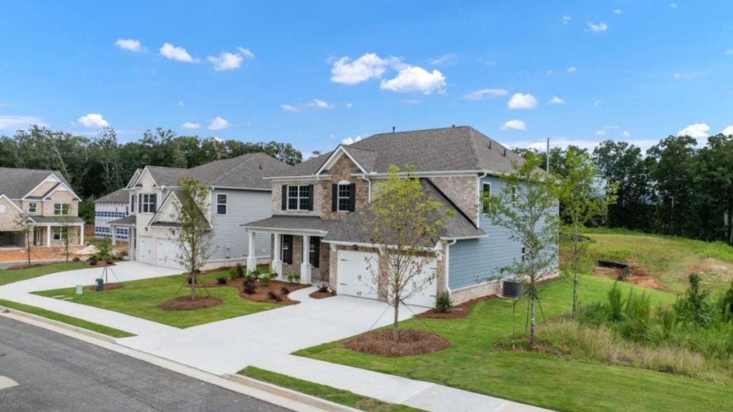 Front exterior of a new home in Butner Estates, South Fulton, GA, highlighting curb appeal (Image 2).