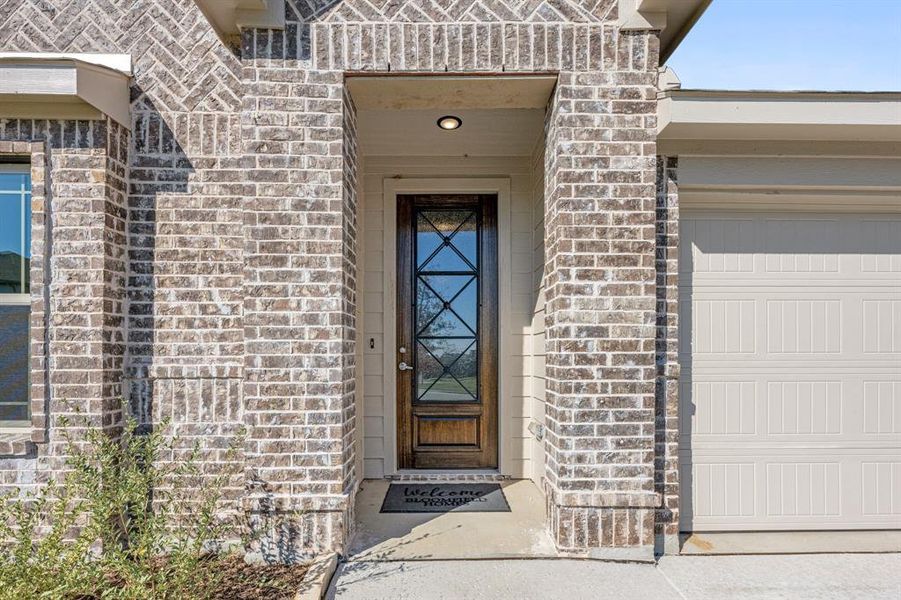 Exterior details and patio area of a home in Godley Ranch Elements, Godley (Image 18). Exterior details and patio area of a home in Godley Ranch Elements, Godley (Image 18).
