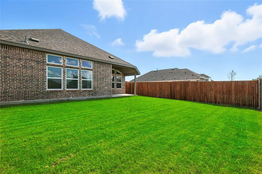 View of yard featuring a patio View of yard featuring a patio
