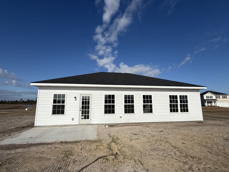 Exterior details and patio area of a home in The Village at Sassafras, Allenhurst (Image 2). Exterior details and patio area of a home in The Village at Sassafras, Allenhurst (Image 2).