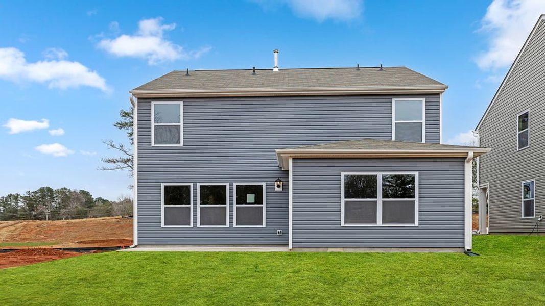 Exterior details and patio area of a home in Durbin Meadows, Fountain Inn (Image 3). Exterior details and patio area of a home in Durbin Meadows, Fountain Inn (Image 3).