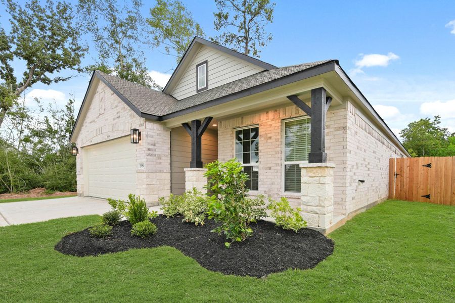 Front exterior of a new home in Barton Creek Ranch, Conroe, TX, highlighting curb appeal (Image 14). Front exterior of a new home in Barton Creek Ranch, Conroe, TX, highlighting curb appeal (Image 14).