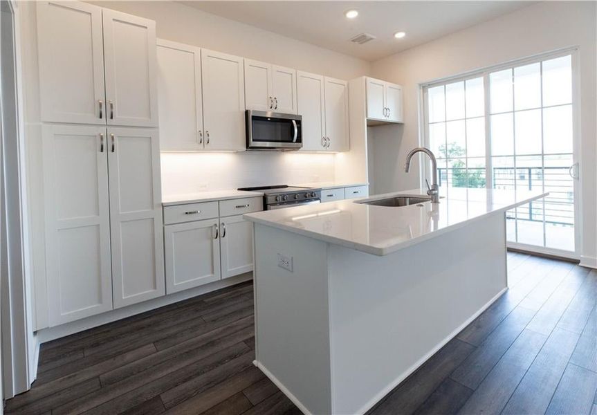 9 ft ceilings on main living level with hardwoods throughout *Home is Under Construction. Photos shown are from other TPG Communities to display how the home will live*