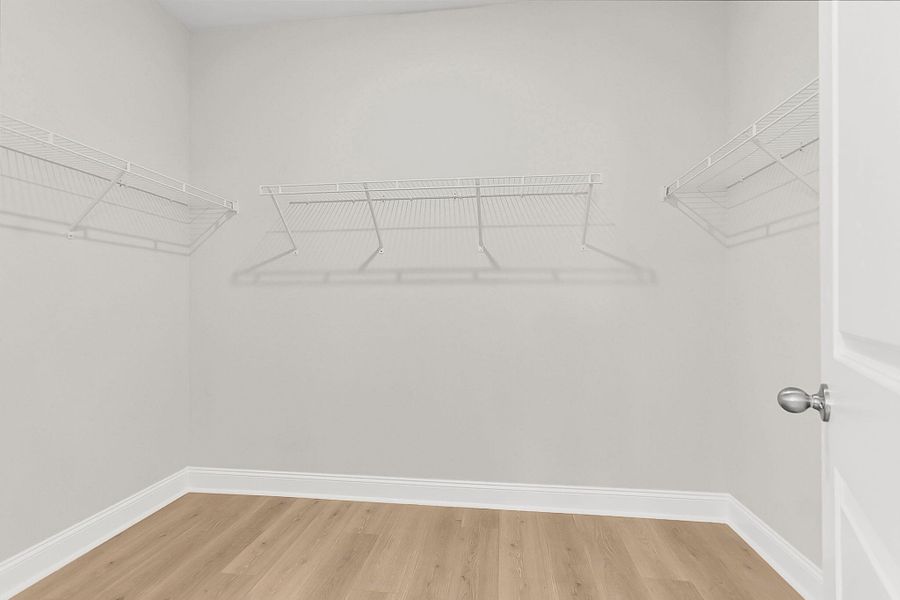 Spacious, unfurnished interior of a new home in Tidewater at Lakes of Cane Bay, Summerville (Image 38).
