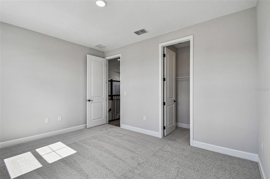Spacious, unfurnished interior of a new home in Solace at Corner Lake, Orlando (Image 46).