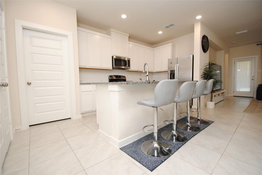Furnished interior view inside a new home in Mason Woods, Cypress (Image 6).