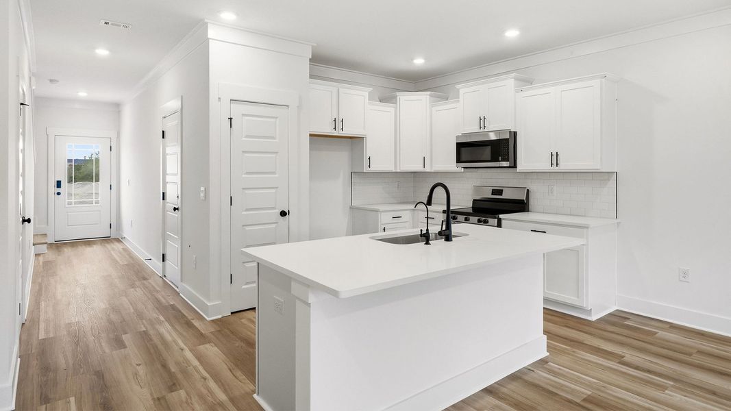 Representative furnished interior of a home built from the Palm Interior by D.R. Horton in Palm Street Townhomes, Destin (Image 5).