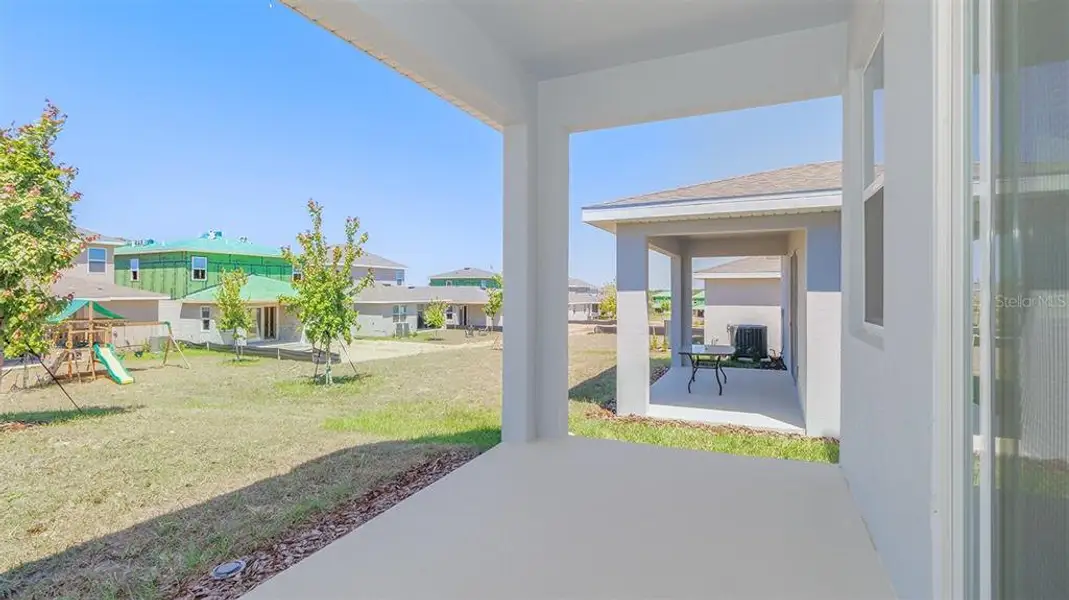 Exterior details and patio area of a home in , Minneola (Image 4).