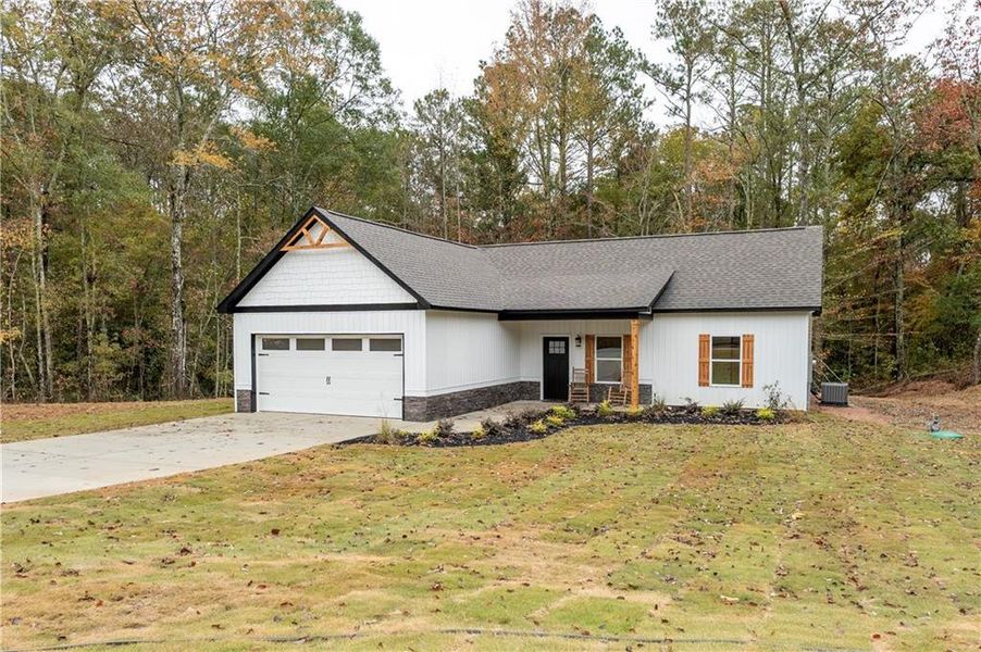 Front exterior of a new home in , Dallas, GA, highlighting curb appeal (Image 2). Front exterior of a new home in , Dallas, GA, highlighting curb appeal (Image 2).