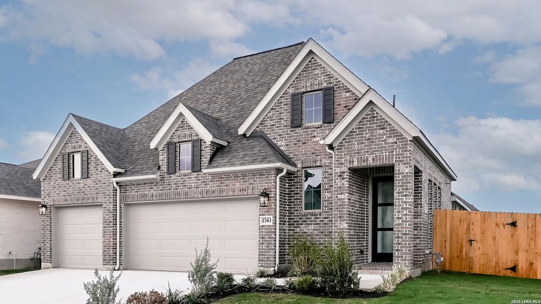 Front exterior of a new home in Meadows of Mill Creek, Seguin, TX, highlighting curb appeal (Image 2).
