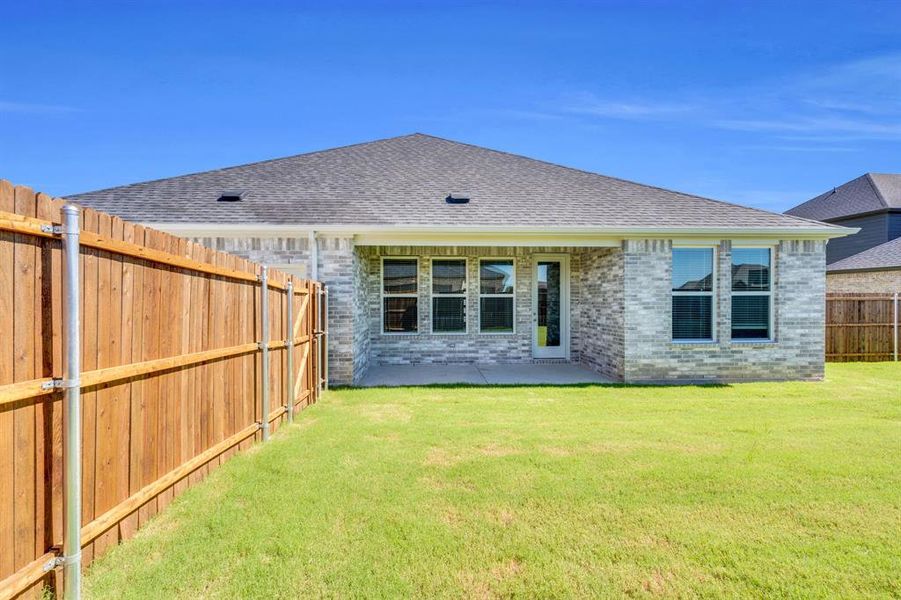 Front exterior of a new home in Ten Mile Creek Estates, DeSoto, TX, highlighting curb appeal (Image 2). Front exterior of a new home in Ten Mile Creek Estates, DeSoto, TX, highlighting curb appeal (Image 2).