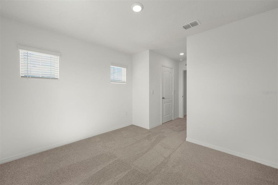 Spacious, unfurnished interior of a new home in Peach Crossings, Winter Haven (Image 22).