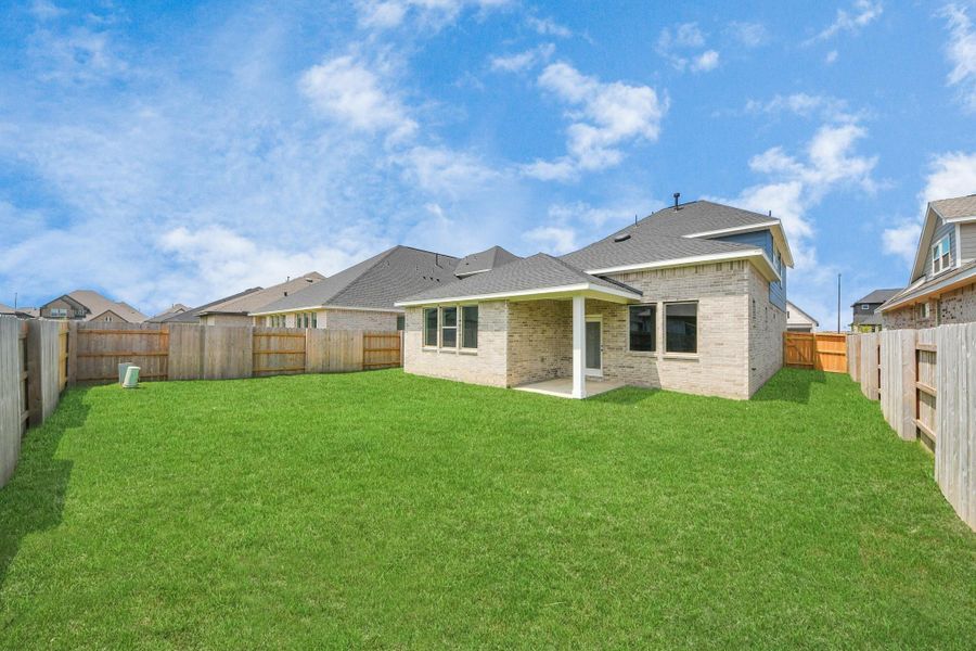 Exterior details and patio area of a home in 45' Traditional Homes at Elyson, Katy (Image 4).