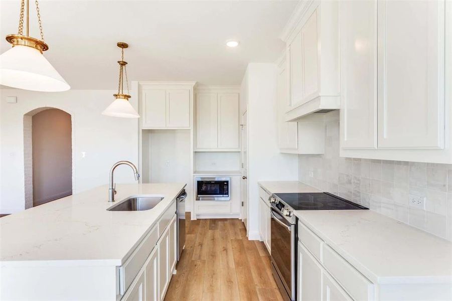 Furnished interior view inside a new home in Courts of Bonnie Brae, Denton (Image 5).