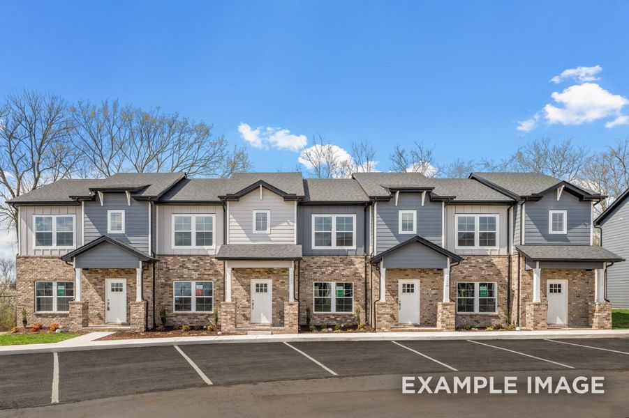 Front exterior of a new home in The Towns at Red River, Gallatin, TN, highlighting curb appeal (Image 25).