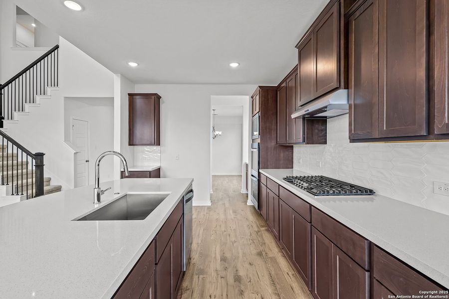 Furnished interior view inside a new home in Homestead 75', Schertz (Image 13).