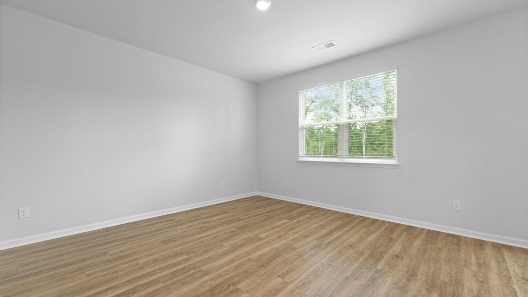 Spacious, unfurnished interior of a new home in Pineview North, Summerville (Image 29).