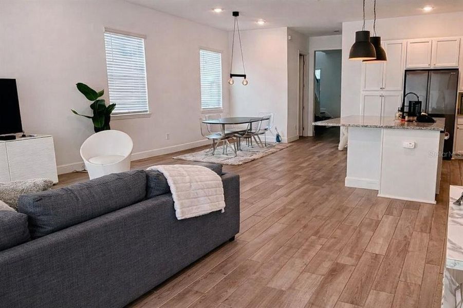 Furnished interior view inside a new home in , Winter Garden (Image 11).