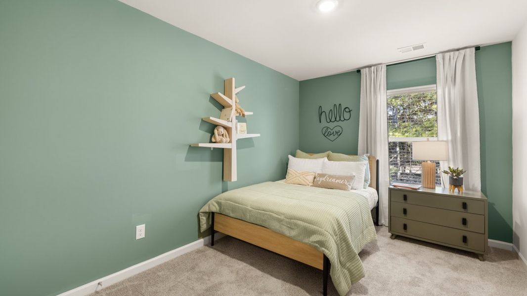Representative furnished interior of a home built from the Pearson II by D.R. Horton in Roseleigh Park, Douglasville (Image 23).