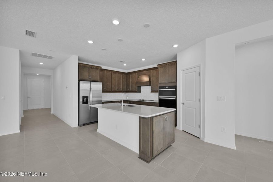 Furnished interior view inside a new home in Hyland Trail, Green Cove Springs (Image 5).