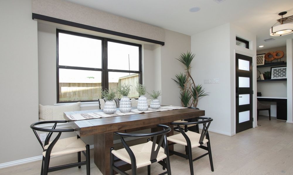 Representative furnished interior of a home built from the Lexington Series - Denton by Brightland Homes in Beamer Villas, Friendswood (Image 9).