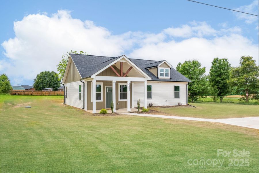 Front exterior of a new home in , Shelby, NC, highlighting curb appeal (Image 24).