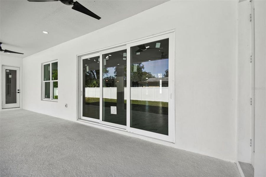 Covered patio with ceiling fans