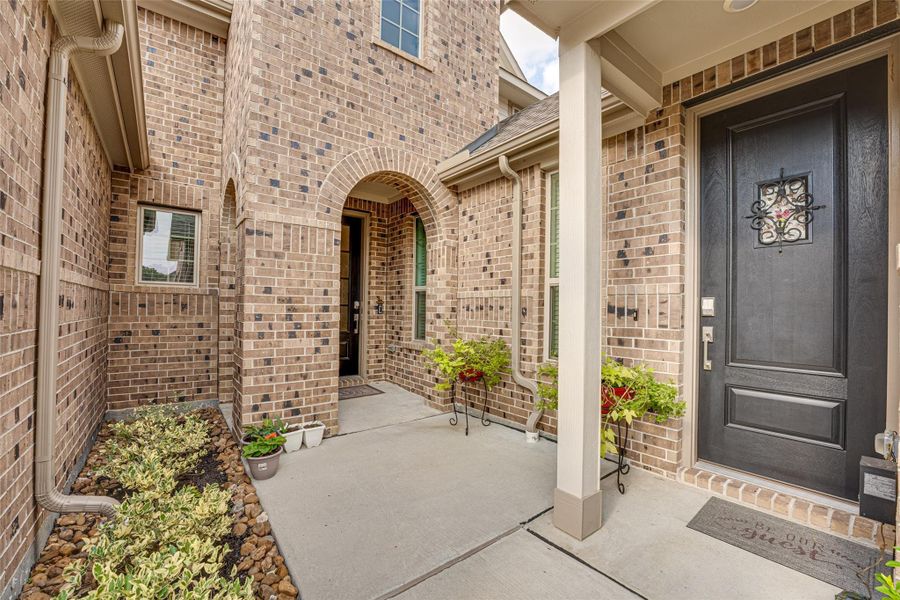 Exterior details and patio area of a home in ARTAVIA: Fairway Collection, Conroe (Image 3).