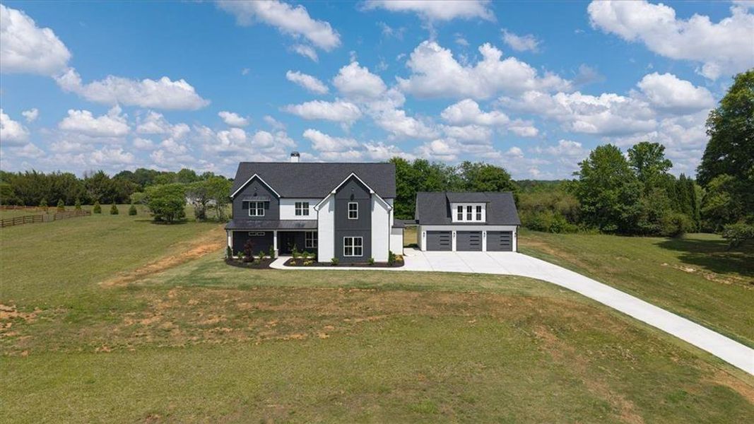 Front exterior of a new home in , Carrollton, GA, highlighting curb appeal (Image 26).