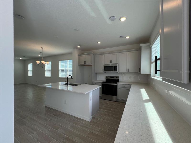 Furnished interior view inside a new home in Northlake Townhomes, Winter Garden (Image 9). Furnished interior view inside a new home in Northlake Townhomes, Winter Garden (Image 9).