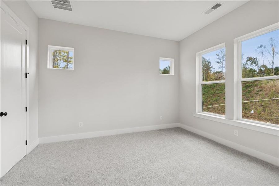 Spacious, unfurnished interior of a new home in Settingdown Farms, Cumming (Image 13).
