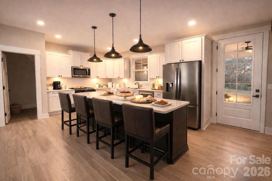 Dream gourmet Kitchen with quartz counters & huge island & large walk in Pantry.