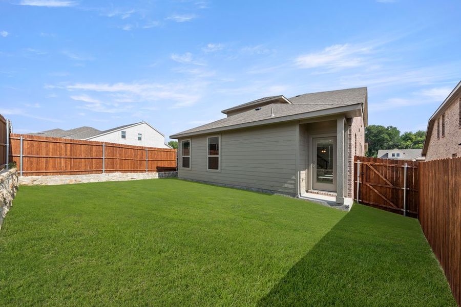 Representative exterior photo of a completed home built from the Willow by Impression Homes in ValleyBrooke, Mesquite, TX (Image 26).