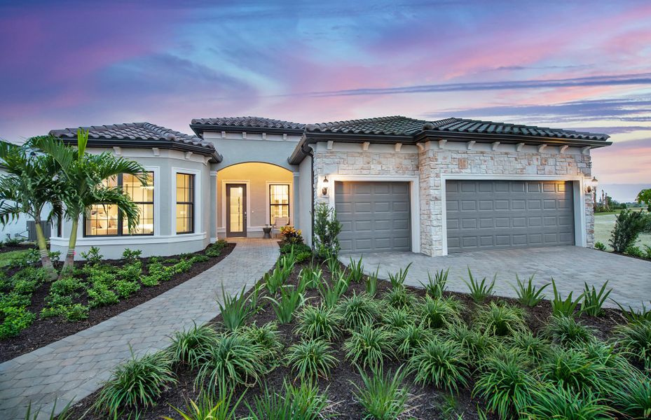Representative exterior photo of a completed home built from the Stellar by DiVosta in Talon Preserve on Palmer Ranch, Nokomis, FL (Image 25).