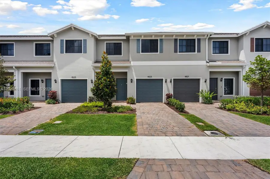 Front exterior of a new home in , Lake Worth, FL, highlighting curb appeal (Image 2). Front exterior of a new home in , Lake Worth, FL, highlighting curb appeal (Image 2).