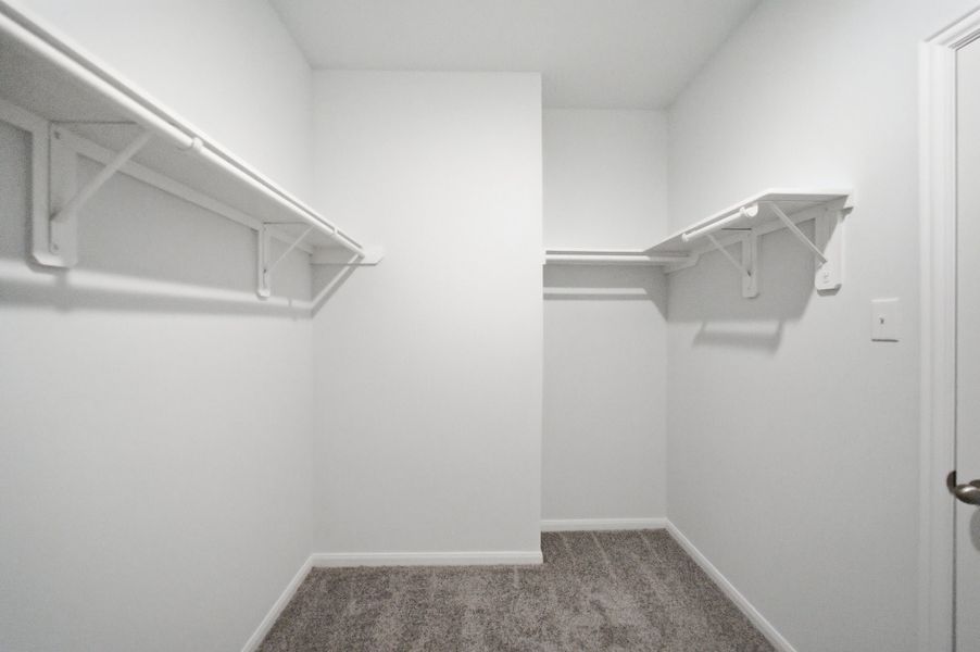 Spacious, unfurnished interior of a new home in The Pines at Seven Coves, Willis (Image 21).