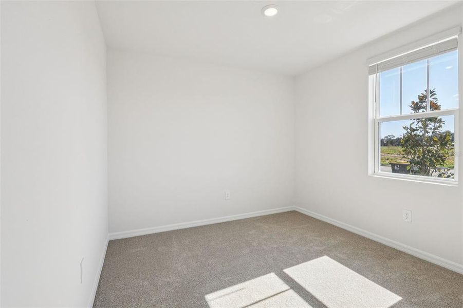 Spacious, unfurnished interior of a new home in Bradbury Creek - Signature Series, Haines City (Image 18).