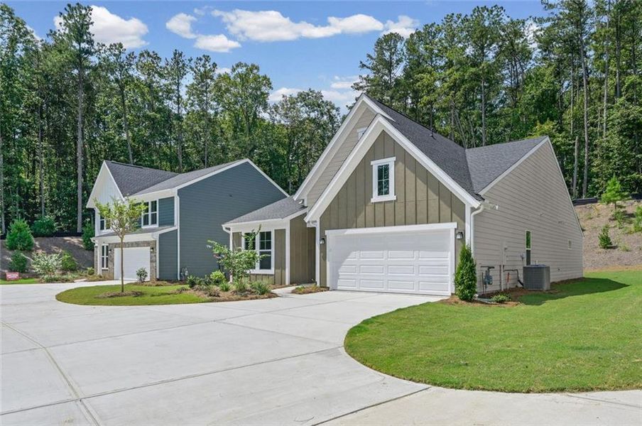 Front exterior of a new home in Easton Park, Dallas, GA, highlighting curb appeal (Image 21).