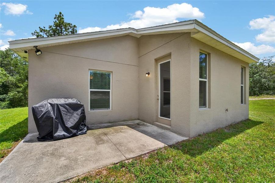 Exterior details and patio area of a home in , Brooksville (Image 23).