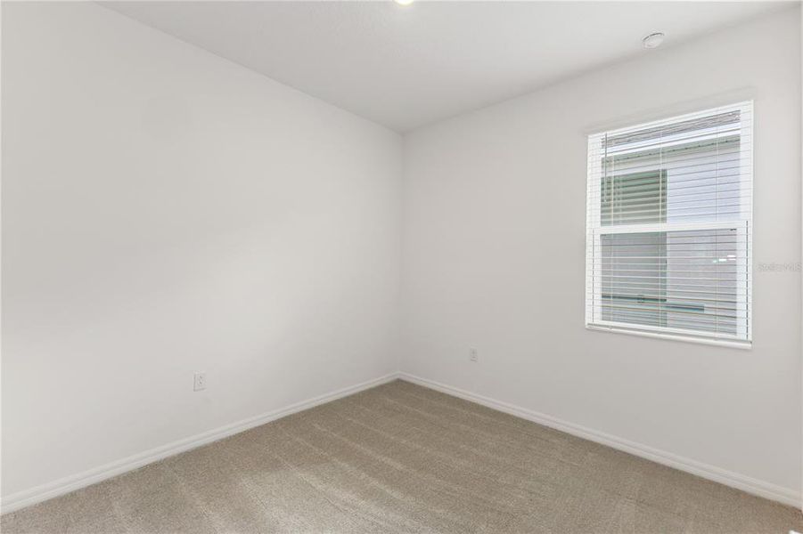 Spacious, unfurnished interior of a new home in Liberty Station, Orange City (Image 13).