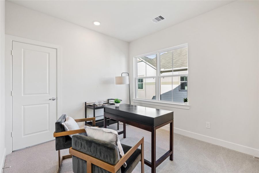 Secondary bedroom with a rear-facing window and enough square footage to work as a home office, guest room, or both. Secondary bedroom with a rear-facing window and enough square footage to work as a home office, guest room, or both.