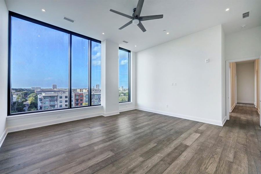 A/V pre-wiring adds convenience to the spacious owner's retreat flanked by a wall of north-facing windows.