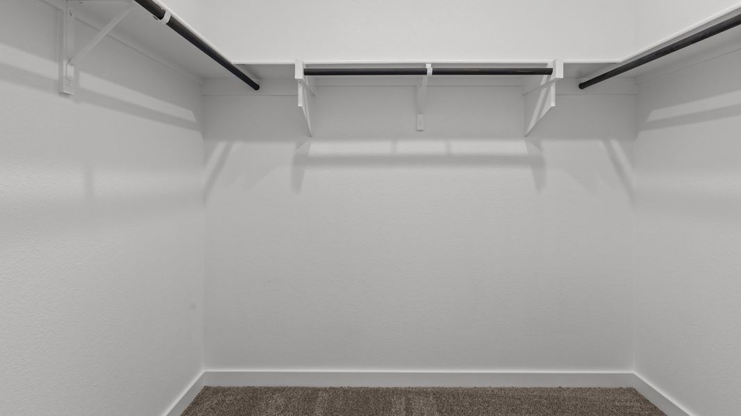 Representative unfurnished interior of a home built from the LAS CRUCES by D.R. Horton in Northwest Passage, Midland (Image 13). Representative unfurnished interior of a home built from the LAS CRUCES by D.R. Horton in Northwest Passage, Midland (Image 13).